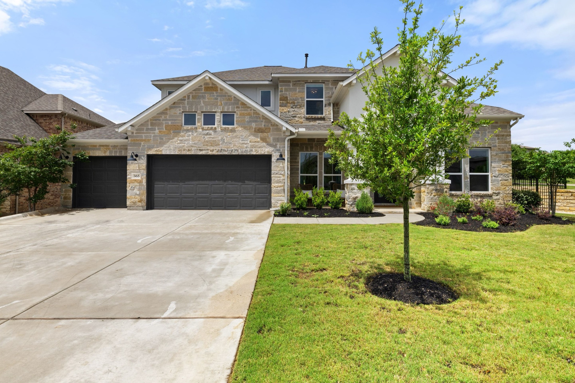 Stone exterior of 365 Pear Tree Lane